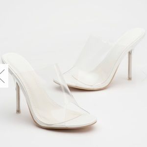 Clear heeled mules